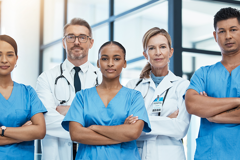 Healthcare professionals standing together in a hospital setting