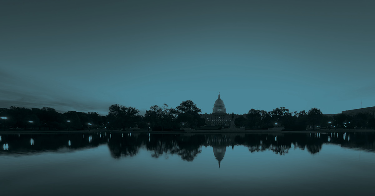DC capitol night sky reflected in the water